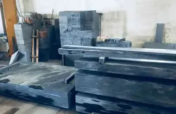 Large structural blocks and slabs of VALONGO BLACK™ slate at the Porto Slate Importers facility