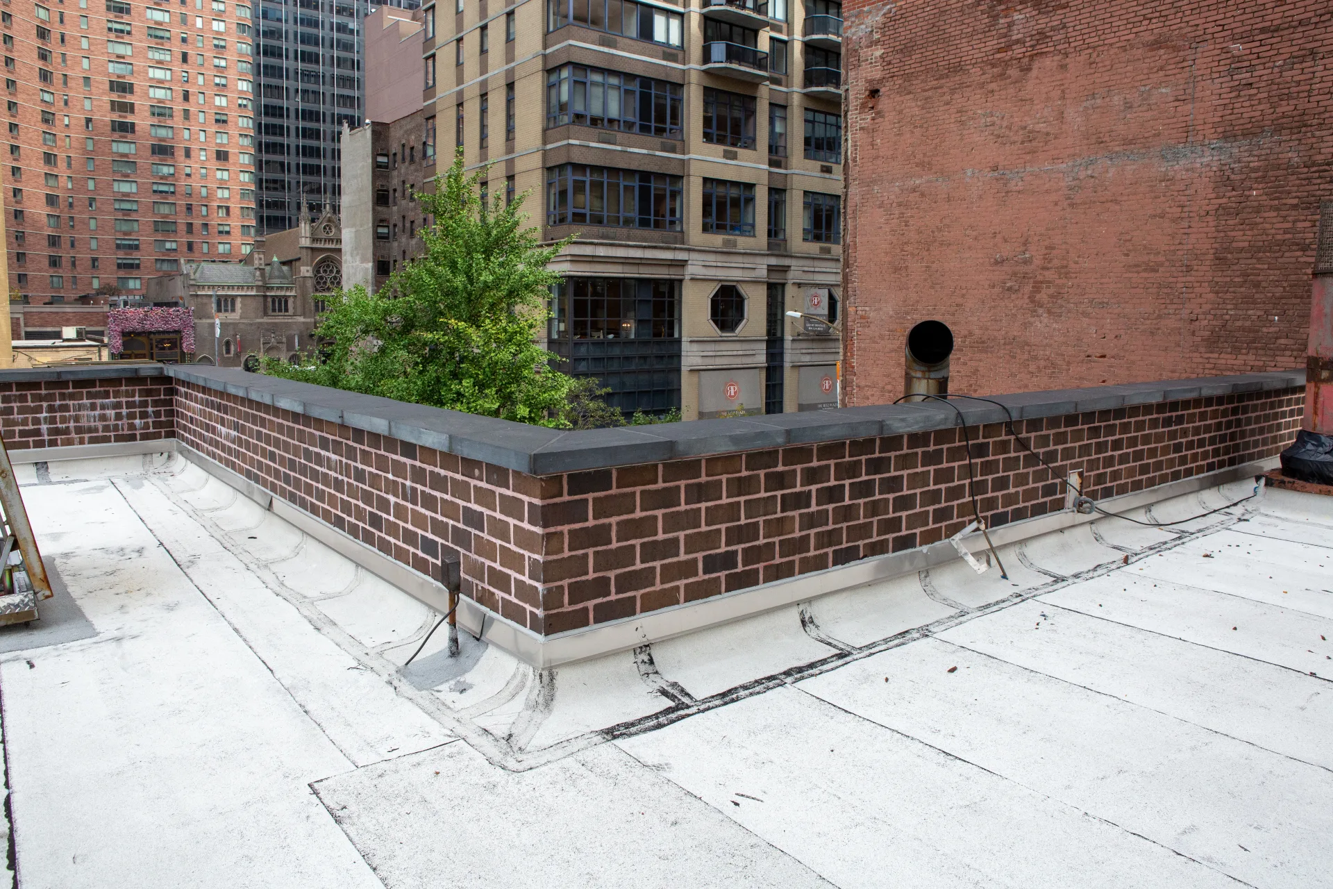 Custom VALONGO BLACK™ Natural Cleft 7 cm Roof Parapet Wall Caps, NYC Firehouse